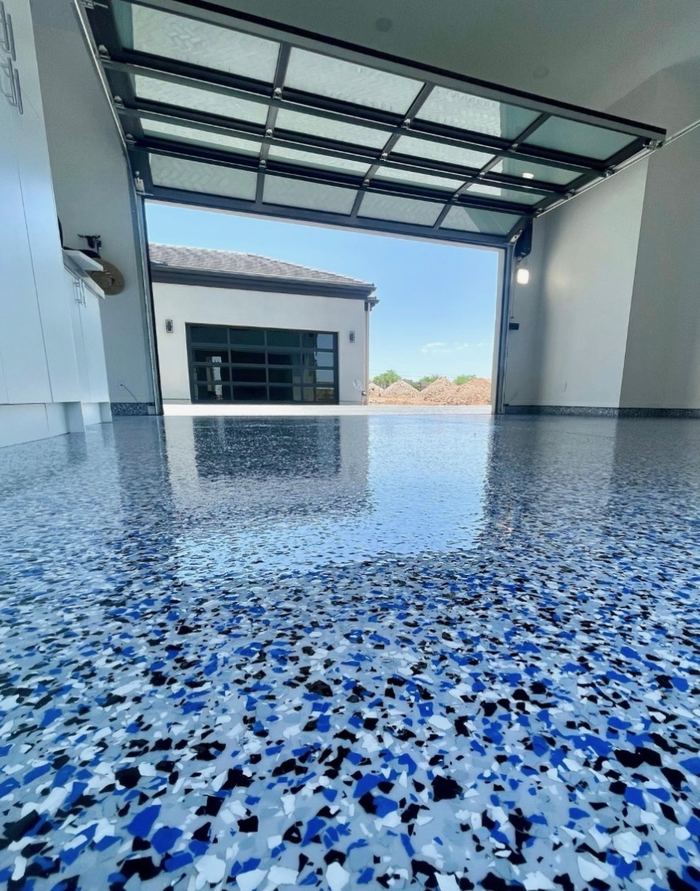 Blue flake garage · open bay — Signature Finishes concrete coating