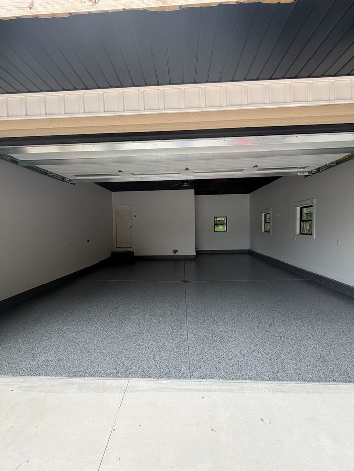 Single color epoxy · clean gray — Signature Finishes concrete coating