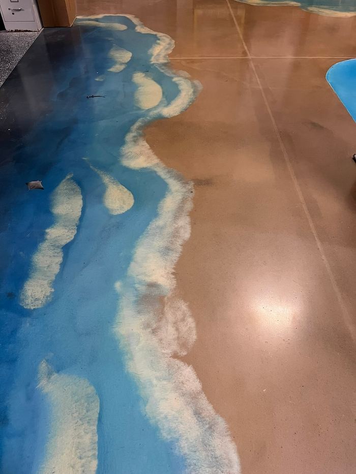 Metallic epoxy · shoreline effect — Signature Finishes concrete coating