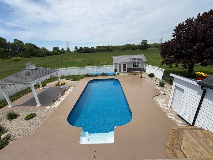 Pool deck · textured coating — Signature Finishes concrete coating