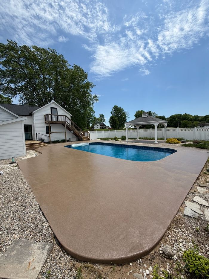 Poolside · slip-resistant finish — Signature Finishes concrete coating