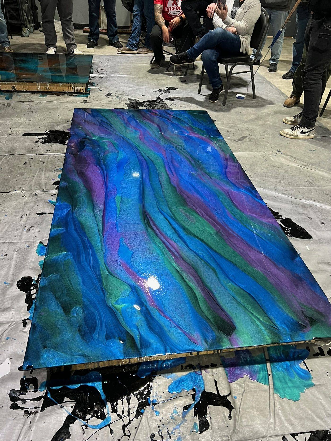 Metallic epoxy in cobalt and emerald &mdash; custom one-of-a-kind pour
